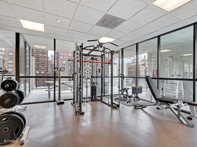 1122 N Clark St Unit 2609, Chicago, IL 60610 - exercise room with a wall of windows and a paneled ceiling