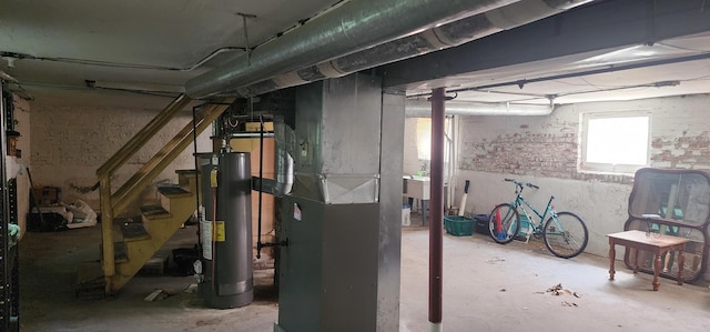 9325 S Loomis St, Chicago, IL 60620 - below grade area featuring water heater, stairway, and heating unit