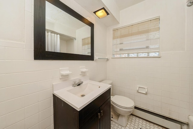 5623 S Hamilton Ave, Chicago, IL 60636 - bathroom with a baseboard radiator, tile walls, vanity, a shower with curtain, and a wainscoted wall