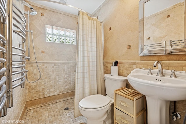 641 Highview Ter, Lake Forest, IL 60045 - full bath featuring tile walls, a towel warming rack, and a tile shower