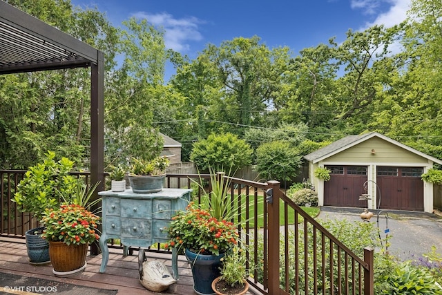 641 Highview Ter, Lake Forest, IL 60045 - deck featuring an outbuilding, a detached garage, and a pergola