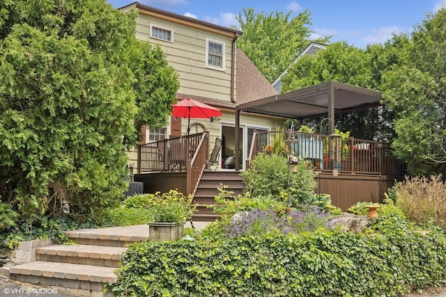 641 Highview Ter, Lake Forest, IL 60045 - back of property with a deck, stairway, and a pergola