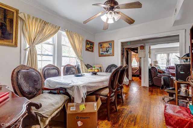 2832 N Mozart St, Chicago, IL 60618 - dining room featuring dark wood-style floors, a ceiling fan, and ornamental molding
