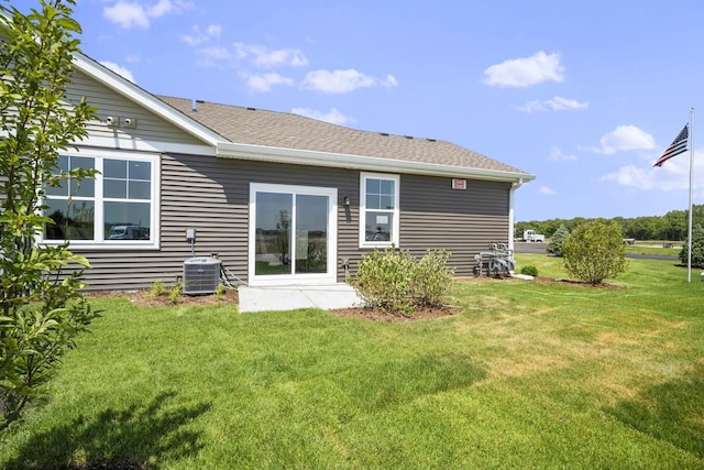 1075 Savannah Ln, Pingree Grove, IL 60140 - back of property with a lawn and roof with shingles