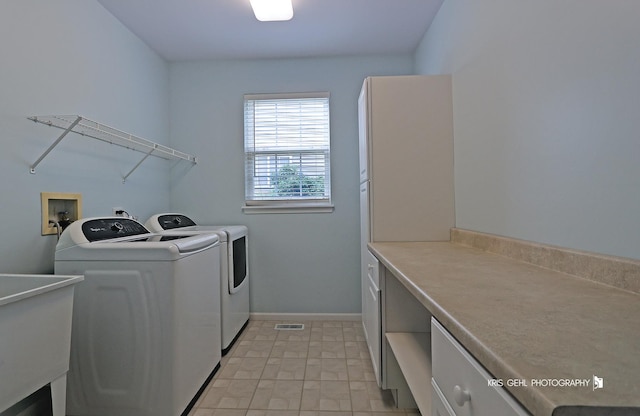 1312 Mulberry Ln, Cary, IL 60013 - laundry room with washer and dryer and cabinet space