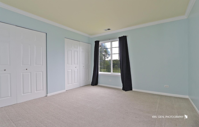 1312 Mulberry Ln, Cary, IL 60013 - unfurnished bedroom with crown molding and carpet floors