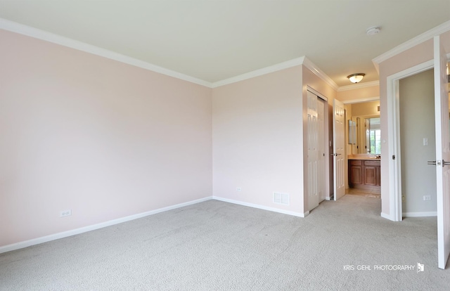 1312 Mulberry Ln, Cary, IL 60013 - spare room featuring ornamental molding, light colored carpet, and a smoke detector