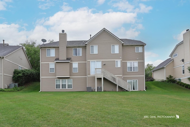 1312 Mulberry Ln, Cary, IL 60013 - back of house featuring a lawn and a chimney