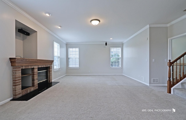 1312 Mulberry Ln, Cary, IL 60013 - unfurnished living room featuring stairs, ornamental molding, plenty of natural light, carpet, and recessed lighting