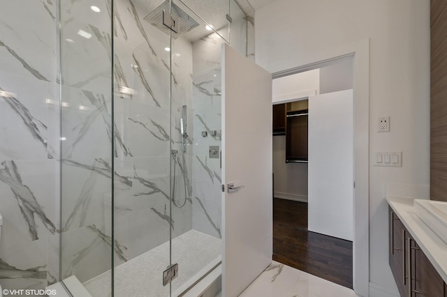 1522 W Huron St Unit 2W, Chicago, IL 60642 - full bath featuring a marble finish shower, vanity, and a walk in closet