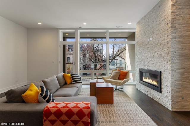1522 W Huron St Unit 2W, Chicago, IL 60642 - living area with wood finished floors, a fireplace, recessed lighting, and expansive windows