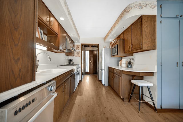 15301 Cherry Ln, Oak Forest, IL 60452 - kitchen featuring gas range gas stove, stainless steel microwave, dishwashing machine, light wood-style flooring, and open shelves