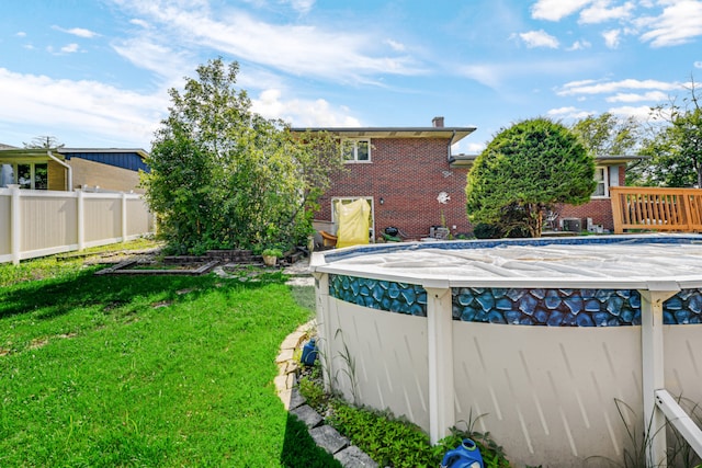 15301 Cherry Ln, Oak Forest, IL 60452 - view of swimming pool with a vegetable garden