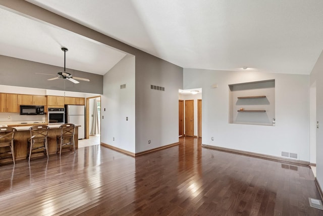 225 Mattek Ct, Dekalb, IL 60115 - living room featuring high vaulted ceiling, ceiling fan, and wood finished floors