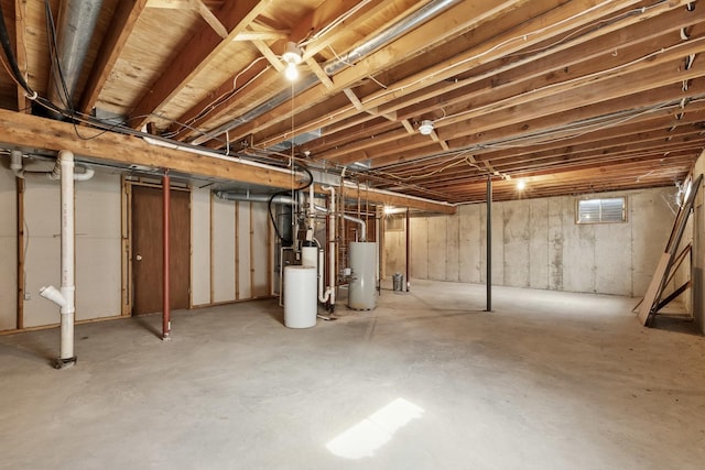 225 Mattek Ct, Dekalb, IL 60115 - unfinished basement featuring gas water heater and a water softener system