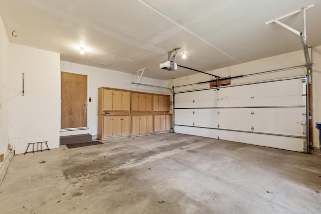 225 Mattek Ct, Dekalb, IL 60115 - garage featuring a garage door opener