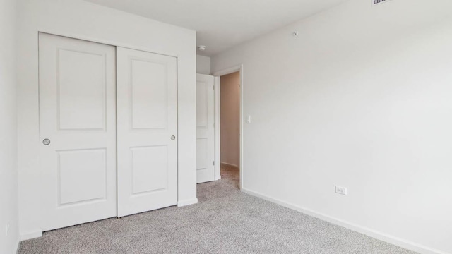 17317 Ulster Dr, Tinley Park, IL 60477 - unfurnished bedroom featuring carpet floors and a closet