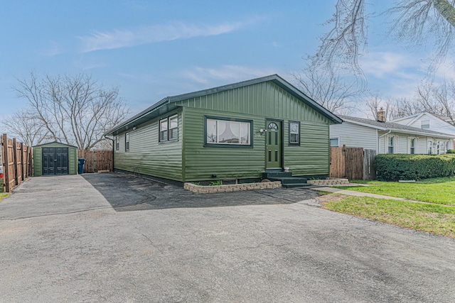 2105 Prospect Ave, North Chicago, IL 60064 - view of front of property featuring entry steps and board and batten siding