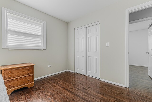 2105 Prospect Ave, North Chicago, IL 60064 - unfurnished bedroom featuring wood finished floors