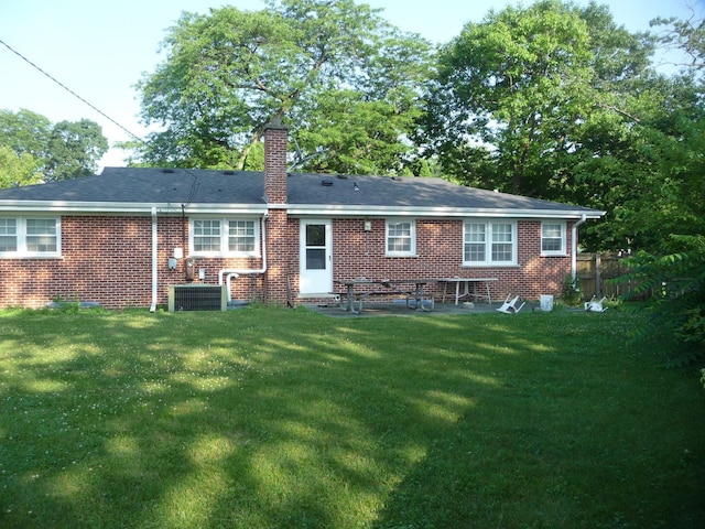 1430 Evergreen Ter, Glenview, IL 60025 - back of property featuring a chimney and brick siding