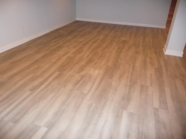 1430 Evergreen Ter, Glenview, IL 60025 - unfurnished room featuring wood finished floors and baseboards