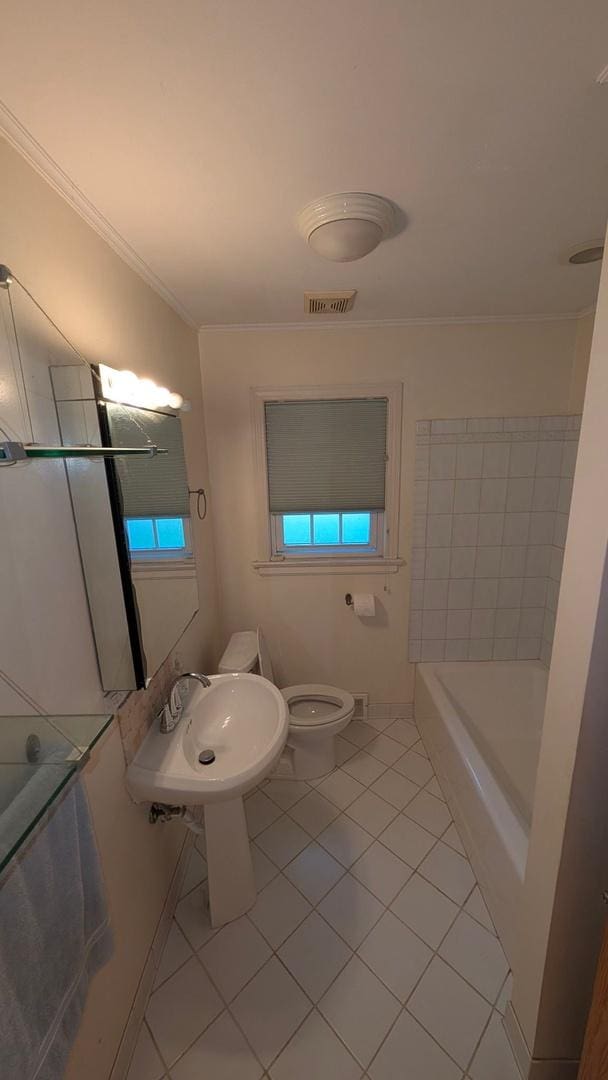 1430 Evergreen Ter, Glenview, IL 60025 - bathroom with tile patterned flooring, a tub to relax in, healthy amount of natural light, and crown molding