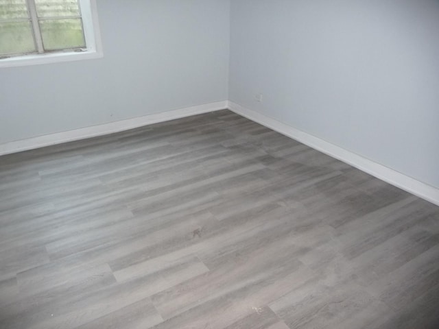 1430 Evergreen Ter, Glenview, IL 60025 - empty room featuring baseboards and dark wood finished floors