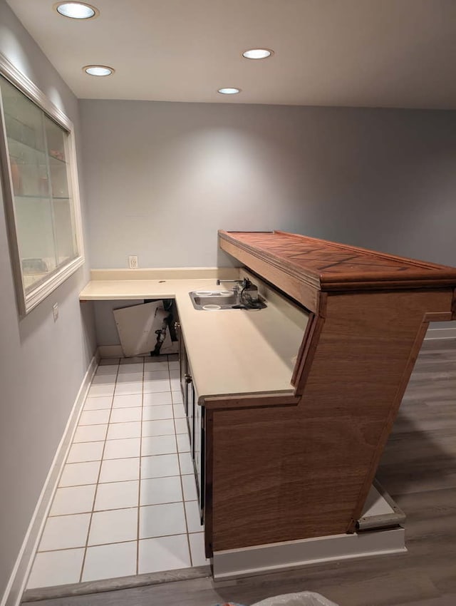 1430 Evergreen Ter, Glenview, IL 60025 - kitchen featuring a peninsula, light tile patterned floors, recessed lighting, and light countertops