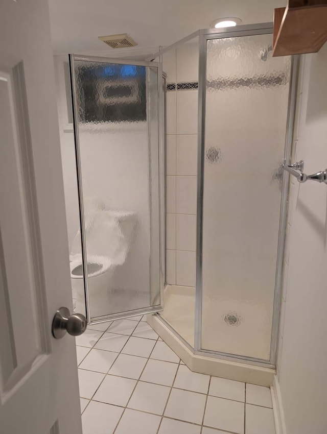 1430 Evergreen Ter, Glenview, IL 60025 - bathroom with tile patterned flooring and a shower stall