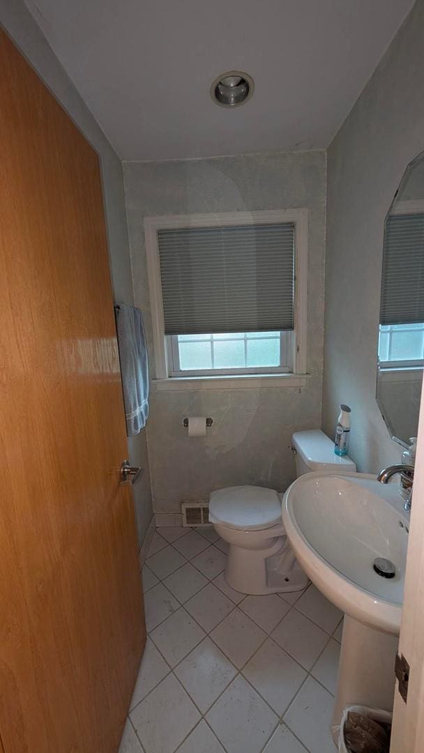 1430 Evergreen Ter, Glenview, IL 60025 - half bathroom featuring tile patterned floors and toilet