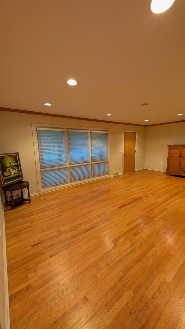 1430 Evergreen Ter, Glenview, IL 60025 - unfurnished room featuring ornamental molding, recessed lighting, and light wood-style floors