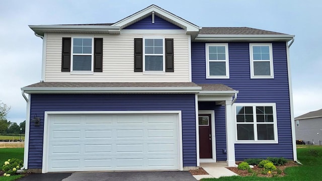 11300 Wildridge Ln, Huntley, IL 60142 - traditional-style house with asphalt driveway and a garage
