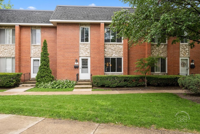 502 Burning Tree Ln, Naperville, IL 60563 - multi unit property featuring stone siding, a front yard, roof with shingles, and brick siding