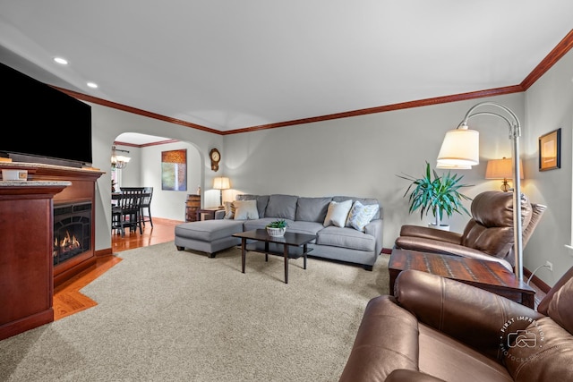 502 Burning Tree Ln, Naperville, IL 60563 - living room featuring arched walkways, ornamental molding, and recessed lighting
