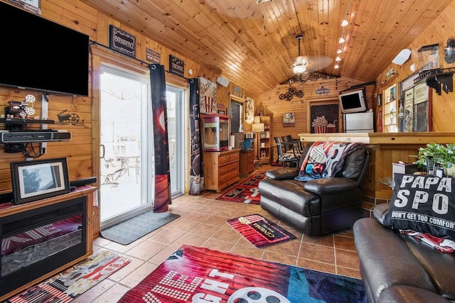 1934 Philip Dr, Dixon, IL 61021 - tiled living area with lofted ceiling, wood walls, and wood ceiling