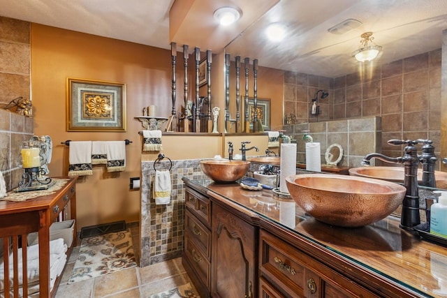 1934 Philip Dr, Dixon, IL 61021 - full bath featuring double vanity, tile walls, and tiled shower