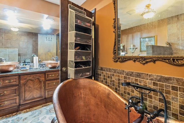 1934 Philip Dr, Dixon, IL 61021 - full bath with tile walls, a soaking tub, and vanity