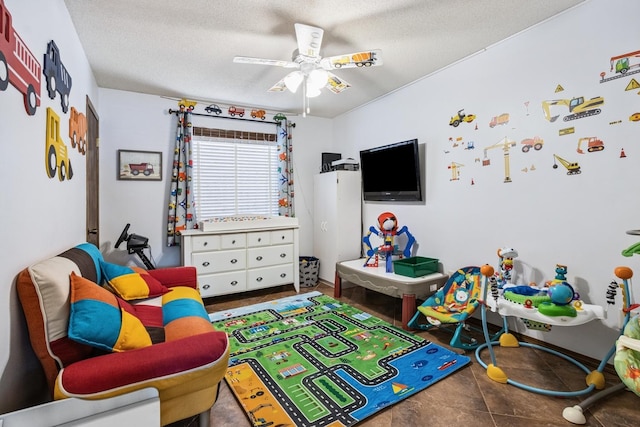 1934 Philip Dr, Dixon, IL 61021 - game room featuring ceiling fan and a textured ceiling