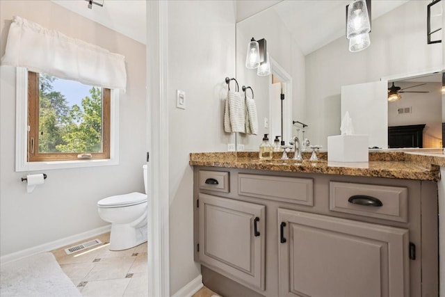237 Carlisle Ave, Westmont, IL 60559 - bathroom featuring a ceiling fan, vanity, and lofted ceiling