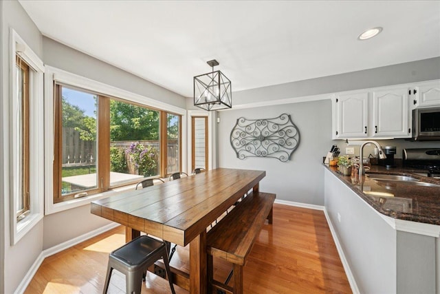 237 Carlisle Ave, Westmont, IL 60559 - dining space with light wood-style flooring, a chandelier, and recessed lighting