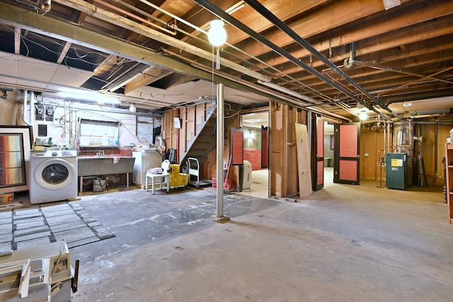 7851 W Cressett Dr, Elmwood Park, IL 60707 - basement with washer / clothes dryer, a workshop area, stairs, and a heating unit