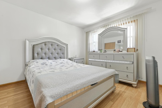 8803 N Grand St, Niles, IL 60714 - bedroom featuring light wood finished floors and baseboards