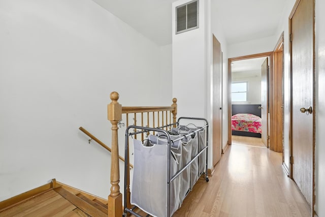 8803 N Grand St, Niles, IL 60714 - hall with an upstairs landing and light wood-type flooring
