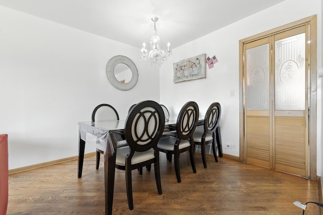 8803 N Grand St, Niles, IL 60714 - dining area featuring a chandelier and wood finished floors