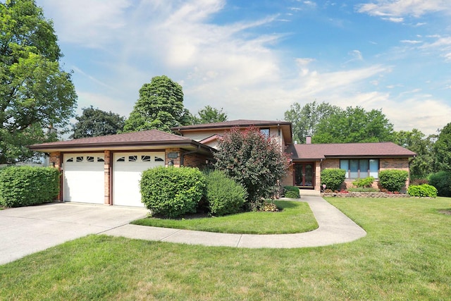 740 Ruskin Dr, Elk Grove Village, IL 60007 - view of front facade with french doors, an attached garage, driveway, a front yard, and brick siding