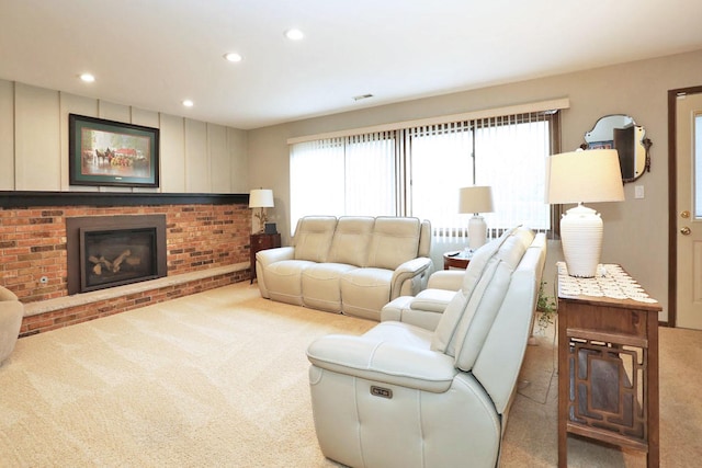 740 Ruskin Dr, Elk Grove Village, IL 60007 - carpeted living room with healthy amount of natural light, a fireplace, and recessed lighting
