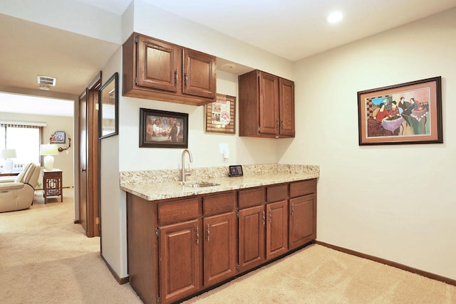740 Ruskin Dr, Elk Grove Village, IL 60007 - kitchen with light carpet and light stone countertops