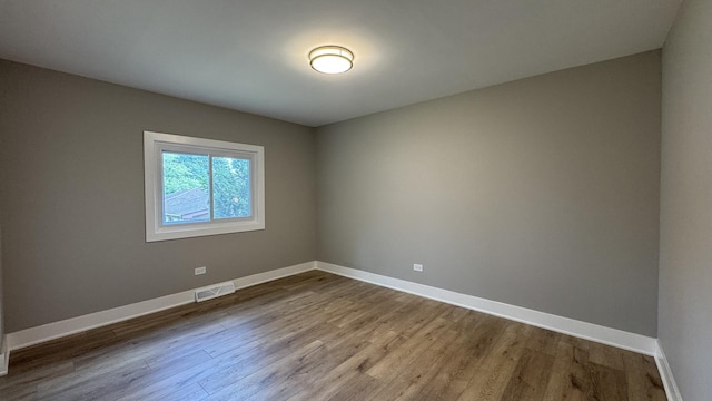 626 E 194th St, Glenwood, IL 60425 - spare room with wood finished floors and baseboards