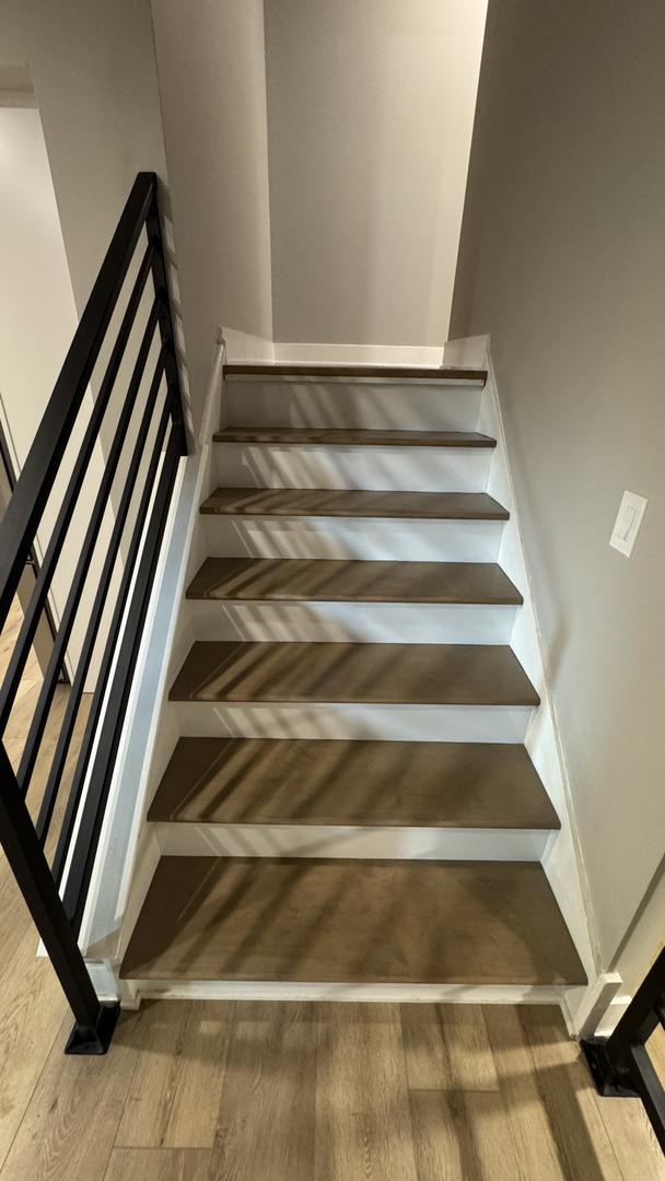 626 E 194th St, Glenwood, IL 60425 - stairway featuring wood finished floors