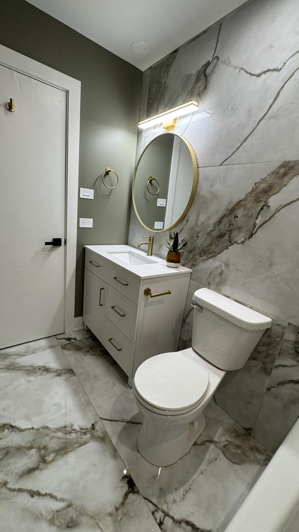 626 E 194th St, Glenwood, IL 60425 - bathroom with marble tiled flooring and vanity